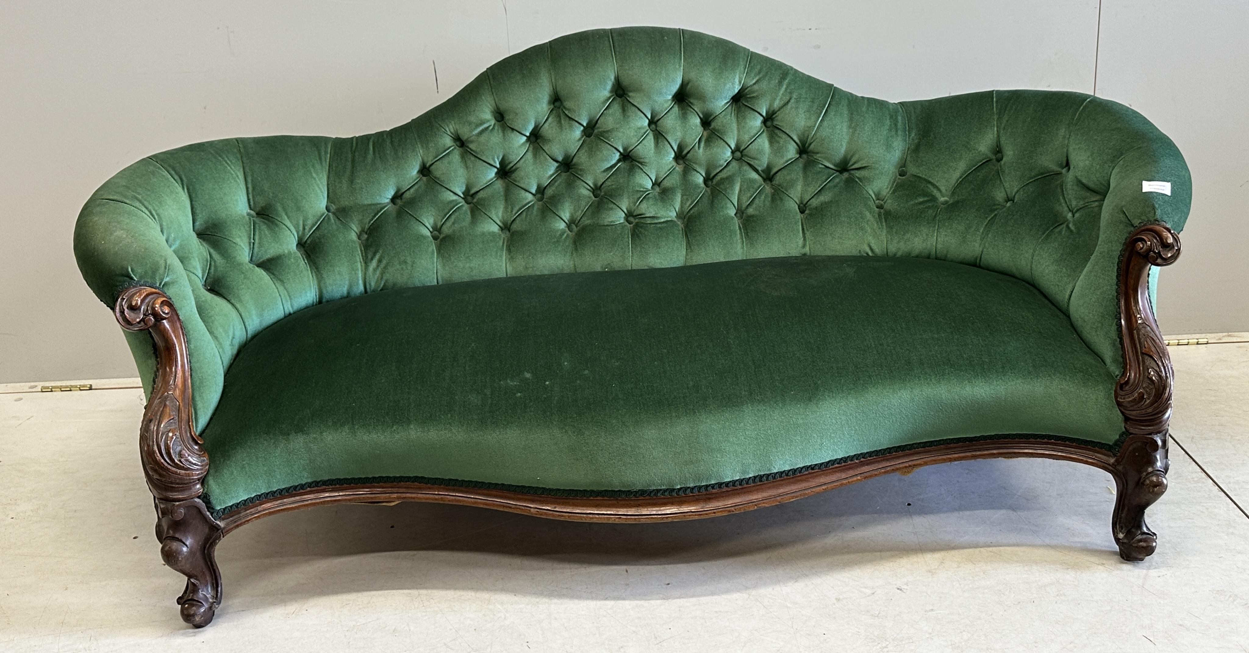 A Victorian rosewood scroll arm deep back buttoned settee, width 184cm, depth 76cm, height 74cm. Condition - good